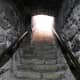 Steps out of the tomb.