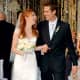 From co-stars to lovers; Alyson Hannigan and Alexis Denisof at their wedding in 2003.