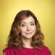 By the sixth season, Lily ditched the darker 'do and returned to her vibrant and stunning red hue.
