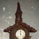 Elaborately carved clock at Little Norway