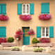 Flowers and colorful shutters.