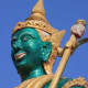 One of the many statues which adorn the local Buddhist temple 