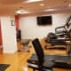 A small fitness center is located below ground level and is available for guests to use.
