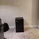 One of the only negatives of this room. The awkward placing of the refrigerator on the floor by itself.