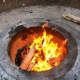 The fire that my husband started up in the fire ring.