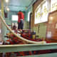 Back view of a hand-powered pumper