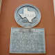 Historical medallion on building
