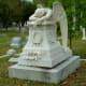 Angel of Grief sculpture used on Hill Monument in Glenwood Cemetery