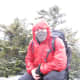 A good set of lightweight waterproof/windproof/breathable shells are paramount for hiking the High Peaks in all seasons.  Here I am on the summit of Porter.  