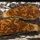 Spoon meat-macaroni mixture into eggplant halves