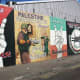 A series of murals at the International Wall in West Belfast