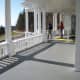 A photo of the wide porch of Flat Top Manor.