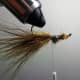 Flip the fishing fly hook up