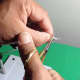 Trim 1/8" of the front legs