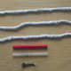 A. Three stands of a mop. B. A Clipper flint barrel. C. A plastic or metal thin tube.