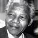Nelson Mandela was born into royalty in Mvezo, a village  in Umtata, Transkei. He belongs to the Thembu clan of the Xhosa people 