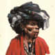 An Artful representation of a Xhosa woman smoking a Xhosa traditional pipe