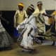 Xhosa women in their traditional garb doing a traditional dance