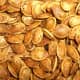 My oven roasted pumpkin seeds weren't as beautiful as this, but they were good tasting. They are a good source of zinc. You can also roast squash seeds.