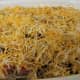 Top with the shredded cheese