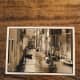 10. Venice, Italy. A postcard from Venice. I love the black and white image on this postcard. The gondola through the canal is a significant of Venice!