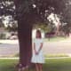 Sarah was very pleased that my wedding dress fit her and she is modeling it here in our front yard in Newbury Park.