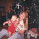 This was the last extended family Christmas celebration at my brother's home. Sarah is holding her younger cousin. She always did like babies.