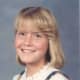 This school picture shows Sarah's ability to smile when she wanted to, and smiling made her beautiful. You will want to constrast this with some of the pictures of Sarah's last year with us and those taken after she left.