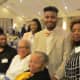 The wife of Walker along with the recipient of Walker Carter scholarship fund sponsored by PECO Energy.