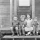  Four Children on a porch  in the United States circa 1910. Photo Archive on Getty Images.