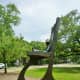 Sculpture titled &ldquo;Retired Cowboy Clown&rdquo; by Hans Molzberger in True South sculpture exhibit Houston 