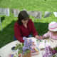 Mother and Daughter coloring  together on Lilac Sunday at the Arnold Arboretum