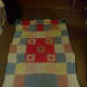 Get creative. This blanket is so easy. Crochet small individual squares and sew together.