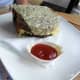 Filling sandwich at Sonnevweld Eetcafe.
