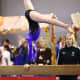 Back Walkover on Beam at a Level 6 Gymnastics Competition (2/4)