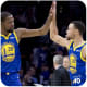 Stephen Curry high fives his teammate Kevin Durant.