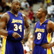 Shaquille O'neal talking with his partner Kobe Bryant.