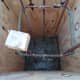 When concrete is poured, tamp it down and into the corners. Then rod it with a length of rebar to remove voids.