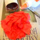 Apply a ring of glue to the inside of the roll and insert coffee filters to make the top and bottom parts of the core.