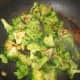 Stir-fry broccoli to fork tender.