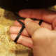 Glue wire pieces into the underside of your hat.