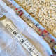 Notice the 56 inch mark on the tape measure. This is where I need the bottom of the original hem to hit. It is at about the 51 3/4 mark in this photo, for reference.
