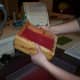 Step 5: Tilt the deckle to an angle, letting the rest of the water drain out.