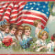 Free vintage post cards for Veterans Day: Children and waving American flag 