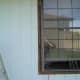 THE OLD WINDOW WITH THE SIDING CUT BACK