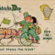 Vintage kids: Boy and girl kissing while riding in a donkey cart "Erin go Bragh"