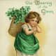Vintage cute kids: Little girl dressed in green and carrying a basket of shamrocks &quot;The wearing of the green&quot;