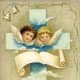 Two Easter angels on a cross with  burlap background
