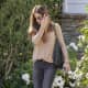 Kate Beckinsale street style in dark denim and high heel boots