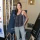 Brooke Burns long legs in her gray slim pants